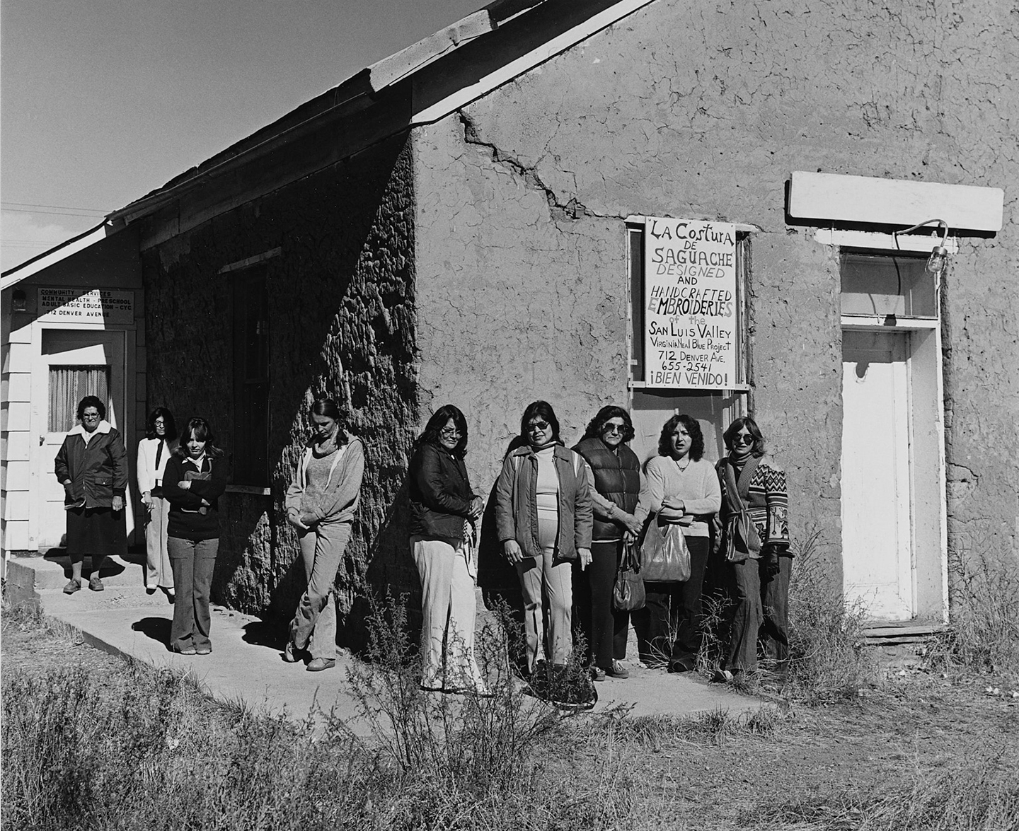 Kathryn Nelson, La Costura de Saguache, 1980. From Left: Margie Gurule, Frances Russell, Nyla Thompson Orvis, Cathy Baxter, Nettie Quintana, Marcella Quintana, Mary Ann Gallegos, Brenda Lovato, Margaret 'Mugs' Batchelder.